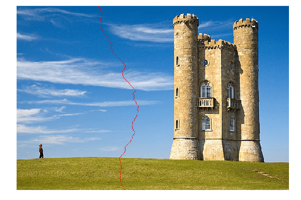 Green grass, on top of it a person in the left, a tower in the right and sky with a few clouds in
the background and middle. The sky starts wide but animation shows it getting narrower.